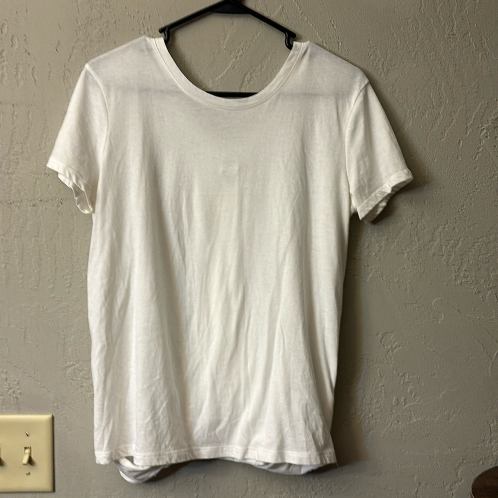 Victoria Sport size medium short sleeve open back workout cotton T-shirt.